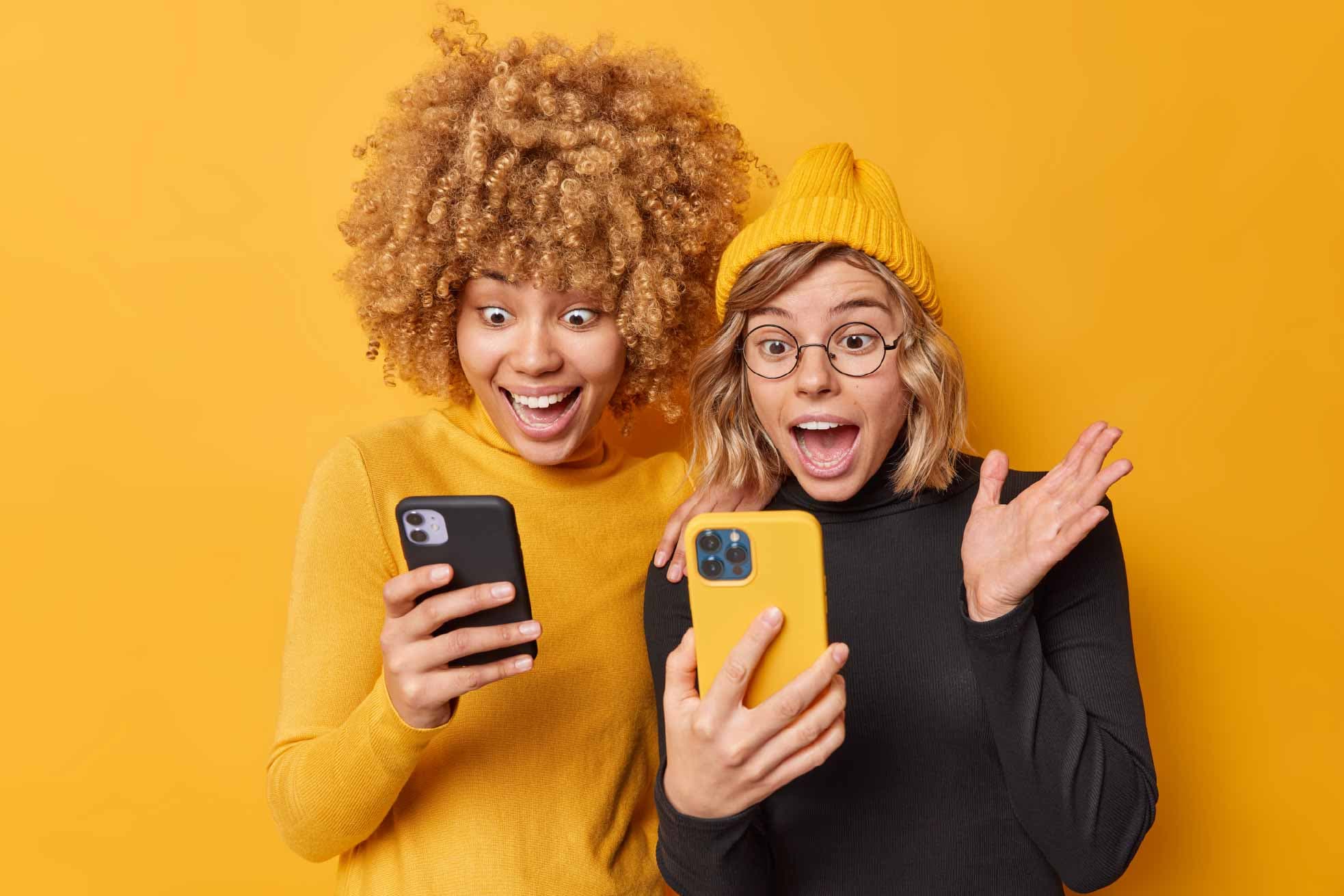 Two people checking WalletSense.AI on their phones